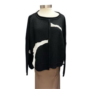 Moyuru Rollneck Abstract Print Sweater